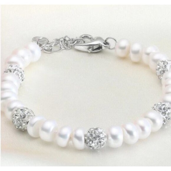 Garden Of Pearls is a Unique one-of-a-kind 7-piece Tiara Bridal Ensemble main image 11